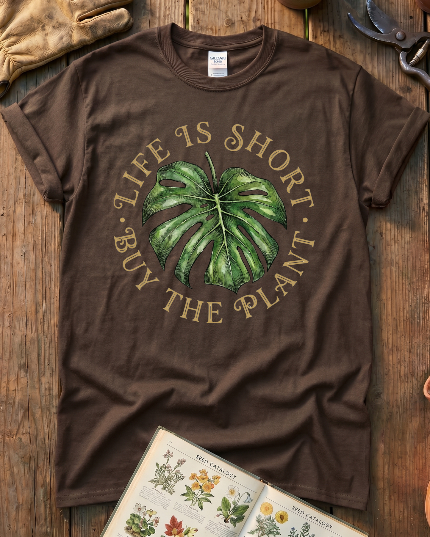 Life Is Short Buy The Plant T‑Shirt